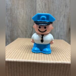 Vintage Fisher-Price Little People figure Police Officer or a Bus driver.